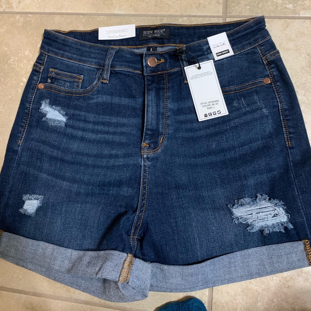 Just blue dark blue shorts.